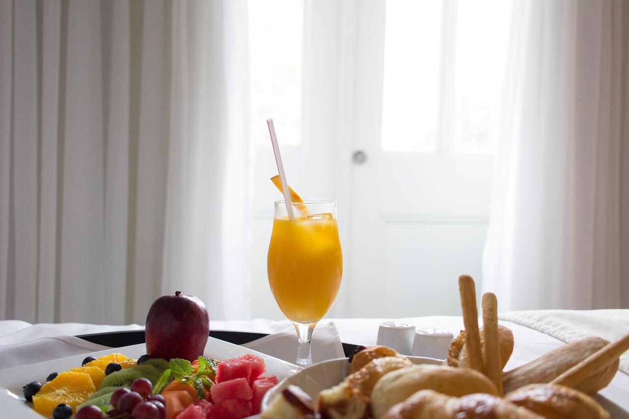 Central Hotel Panama Casco Viejo מראה חיצוני תמונה A glass of orange juice